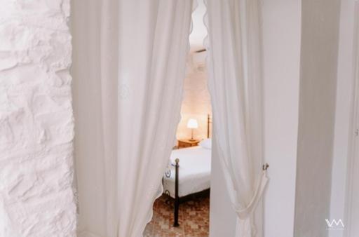 A bed or beds in a room at Lns Vip Villas