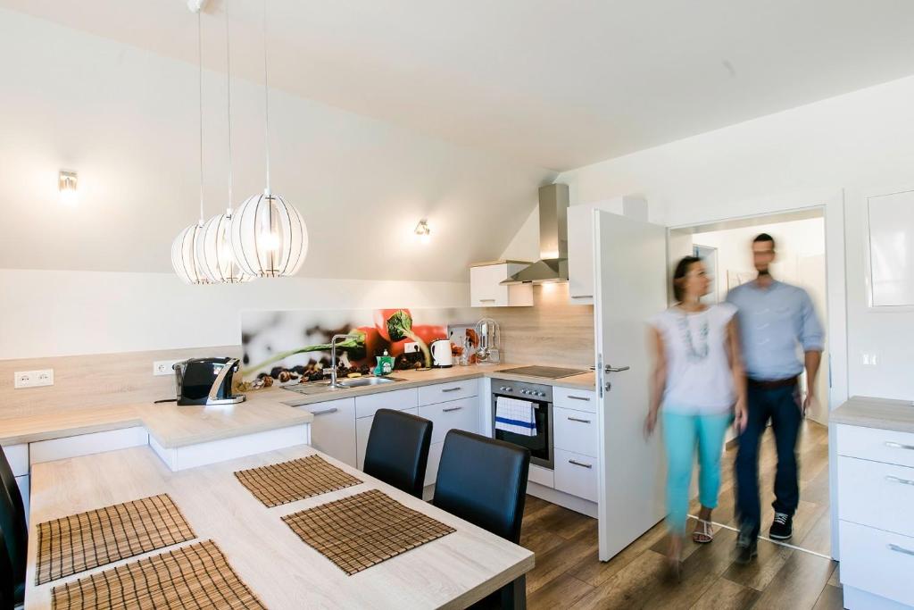 A cozinha ou cozinha compacta de R&amp;R Residenzen Ferienwohnungen