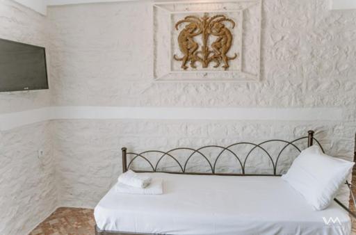 A bed or beds in a room at Lns Vip Villas