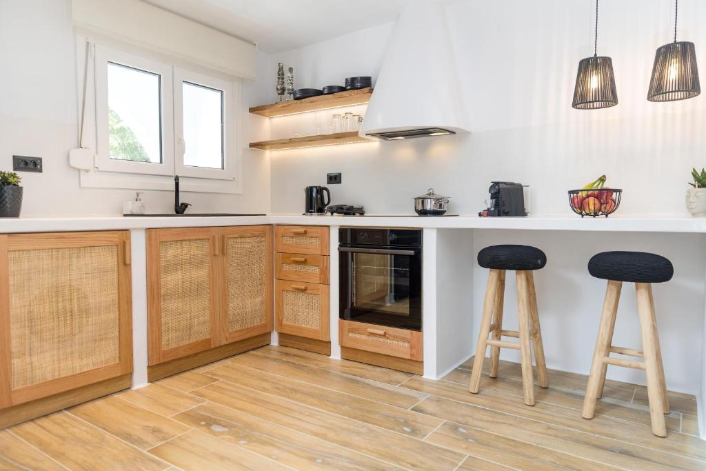 Kuchyňa alebo kuchynka v ubytovaní Naxian Icon Luxury Residence 3
