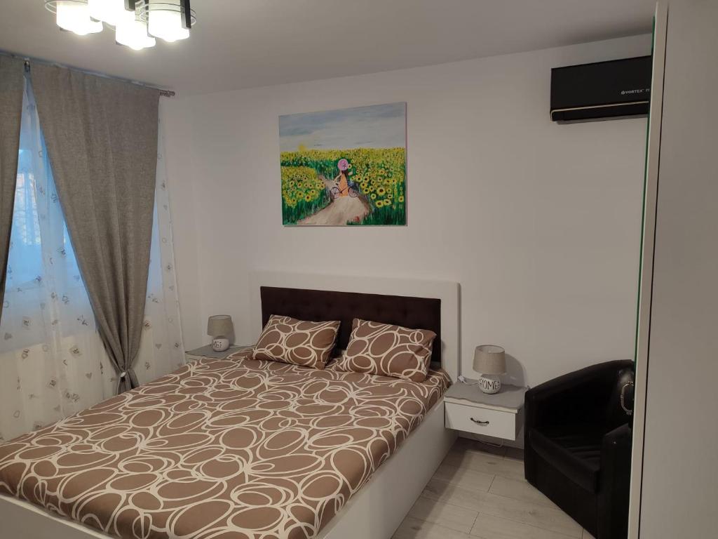 Postel nebo postele na pokoji v ubytování CASA GIA CALIMANESTI