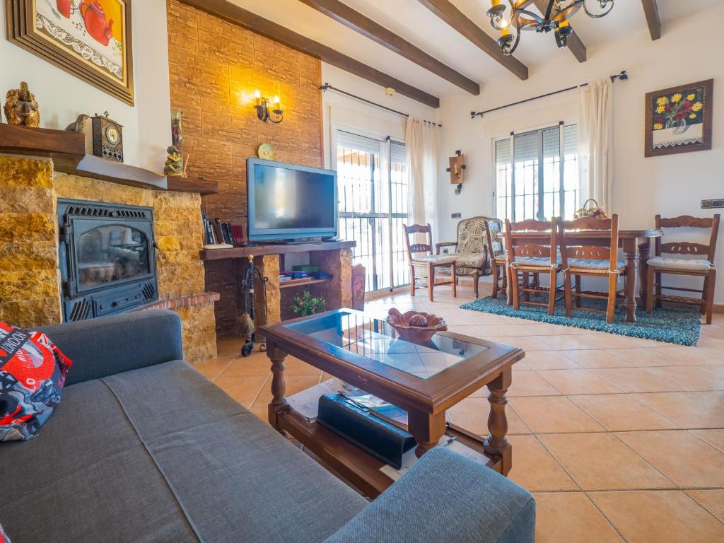 Telewizja i/lub zestaw kina domowego w obiekcie Cubo's Villa Teresa