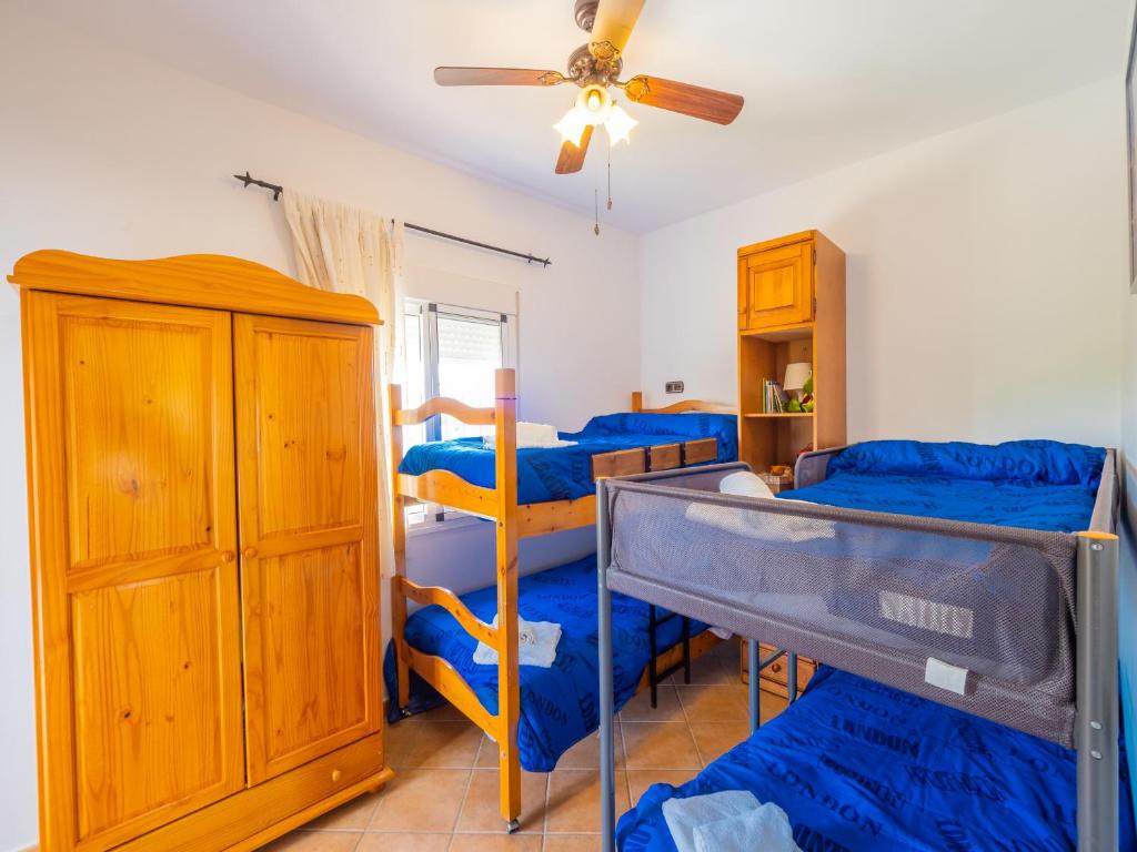 Łóżko lub łóżka w pokoju w obiekcie Cubo's Villa Teresa