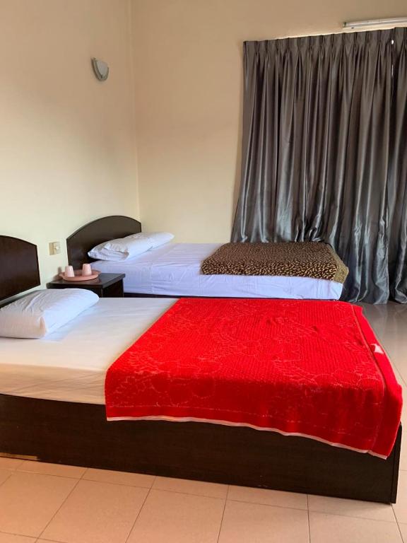 Postel nebo postele na pokoji v ubytování HOTEL MIRAMA 美麗華酒店