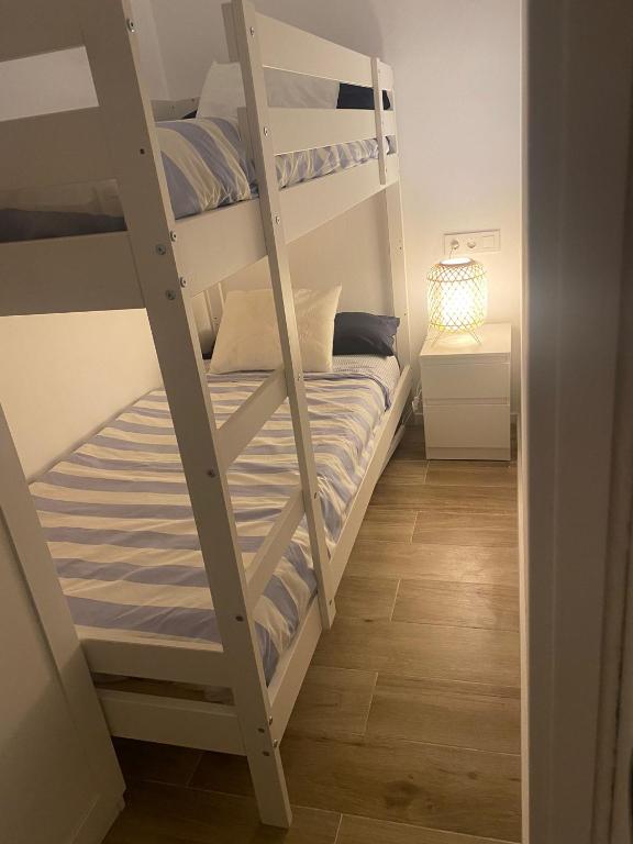 Postel nebo postele na pokoji v ubytování Ingrid Apartment