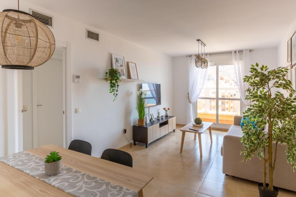 Posezení v ubytování Apartamento Catania en Aguadulce con vistas al mar