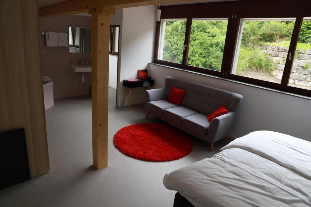Posezení v ubytování L'auberge de Noiraigue