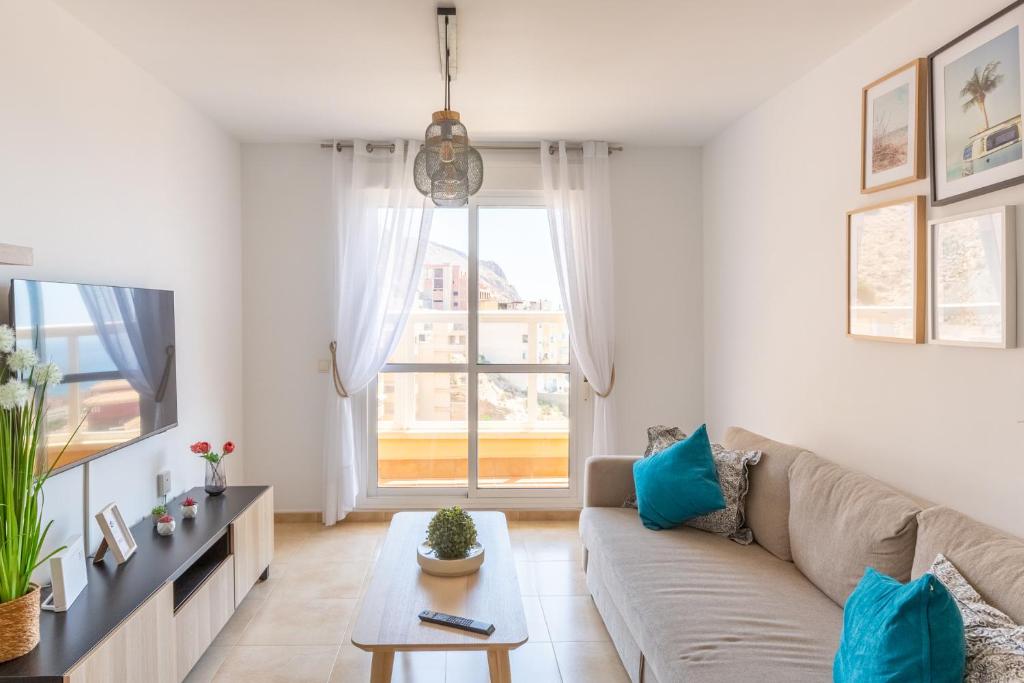 Posezení v ubytování Apartamento Catania en Aguadulce con vistas al mar