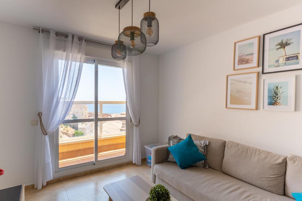 Posezení v ubytování Apartamento Catania en Aguadulce con vistas al mar