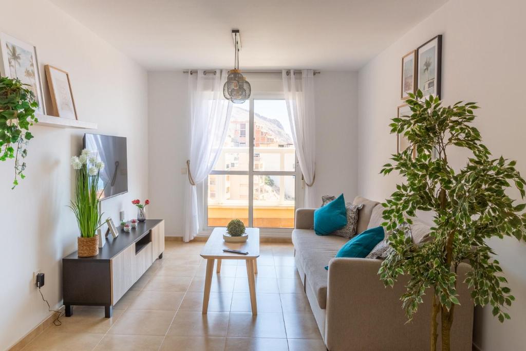 Posezení v ubytování Apartamento Catania en Aguadulce con vistas al mar