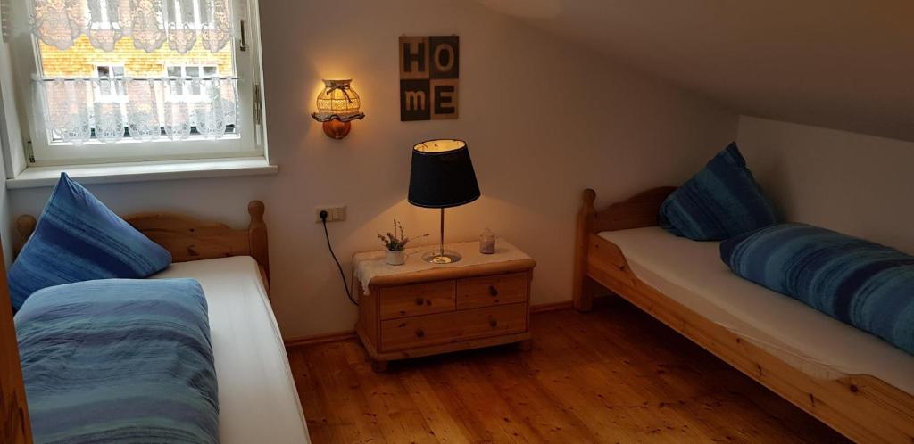 Postel nebo postele na pokoji v ubytování Ferienhaus Alfenz