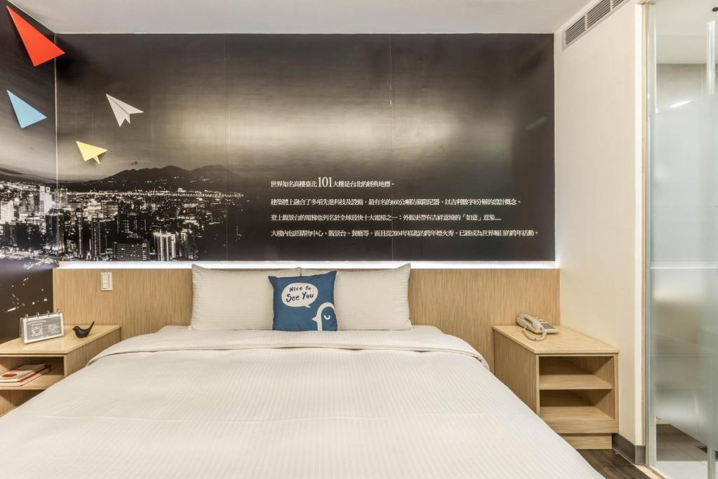 Letto o letti in una camera di CU Hotel Taipei