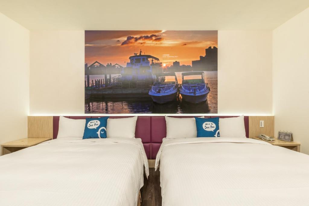 Letto o letti in una camera di CU Hotel Taipei