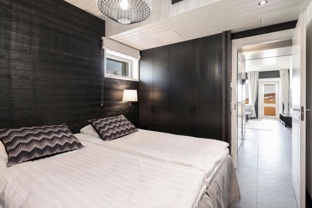 Postel nebo postele na pokoji v ubytování Ski-Inn PyhäLinna