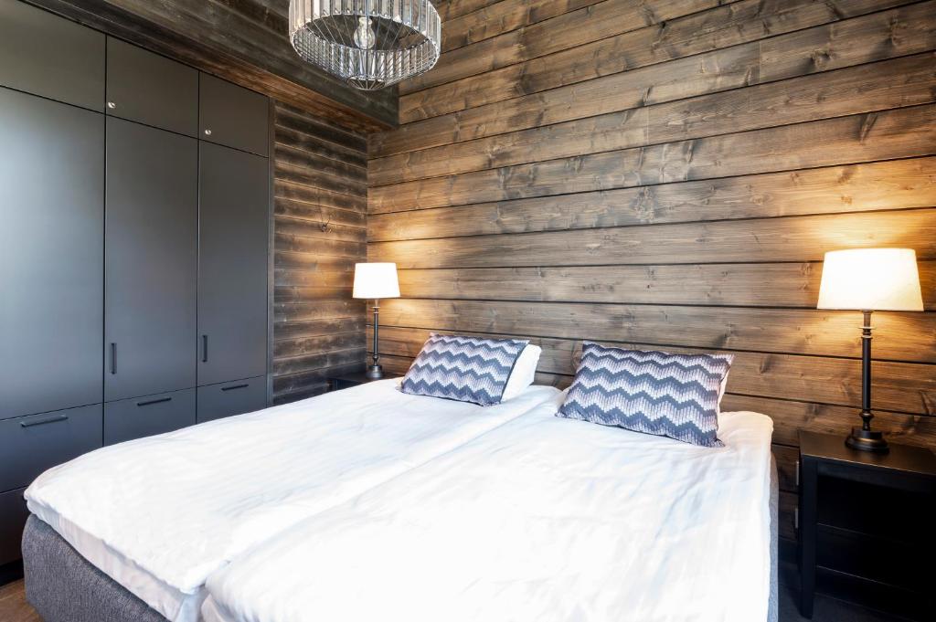 Postel nebo postele na pokoji v ubytování Ski-Inn PyhäLinna