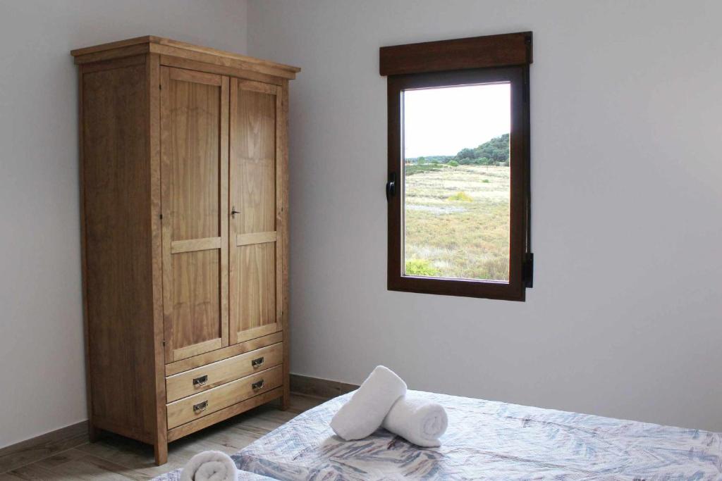 Posteľ alebo postele v izbe v ubytovaní Casas Rurales Tía María