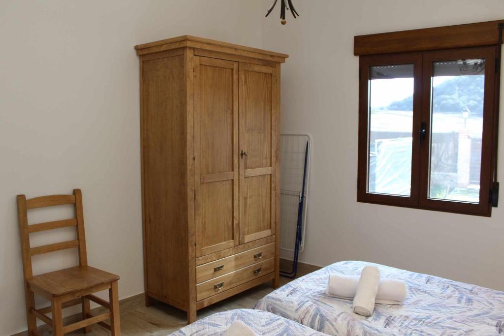 Posteľ alebo postele v izbe v ubytovaní Casas Rurales Tía María