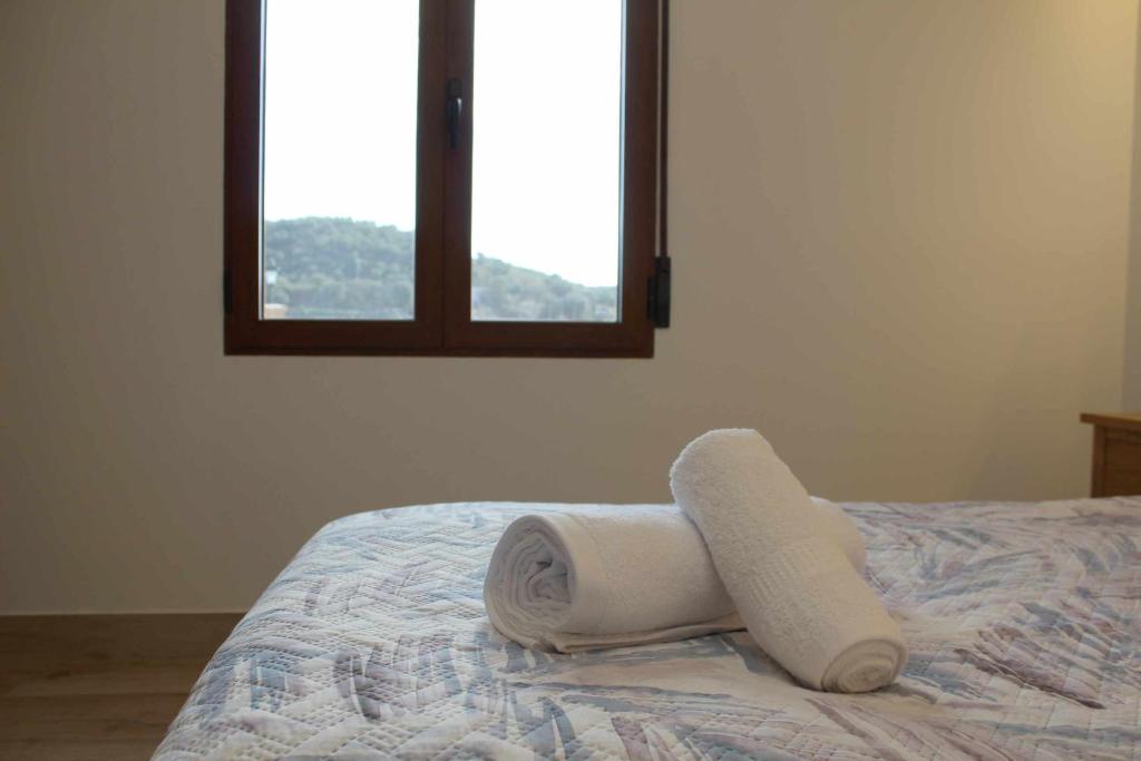 Posteľ alebo postele v izbe v ubytovaní Casas Rurales Tía María