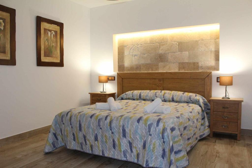 Posteľ alebo postele v izbe v ubytovaní Casas Rurales Tía María