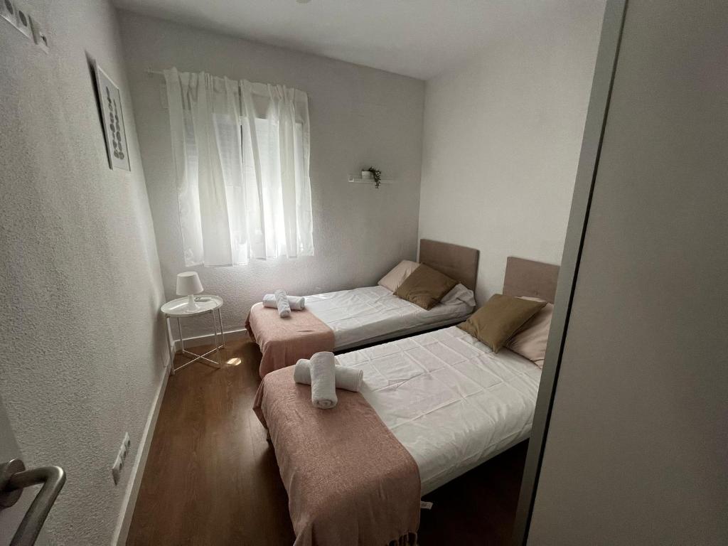 Postel nebo postele na pokoji v ubytování Estupendo apartamento en Estación-Centro, WIFI, Agua por Osmosis