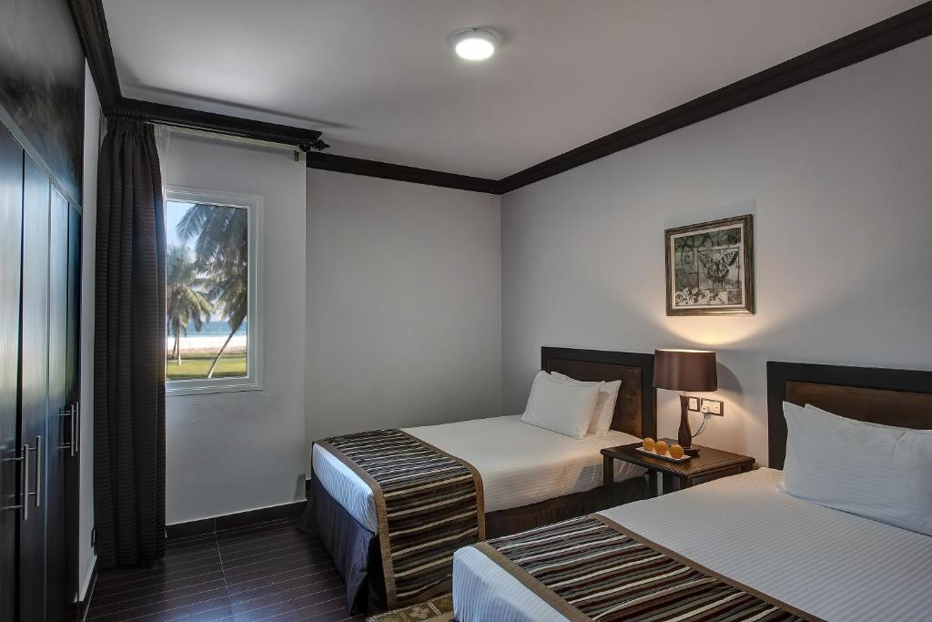 Postel nebo postele na pokoji v ubytování Crowne Plaza Resort Salalah by IHG