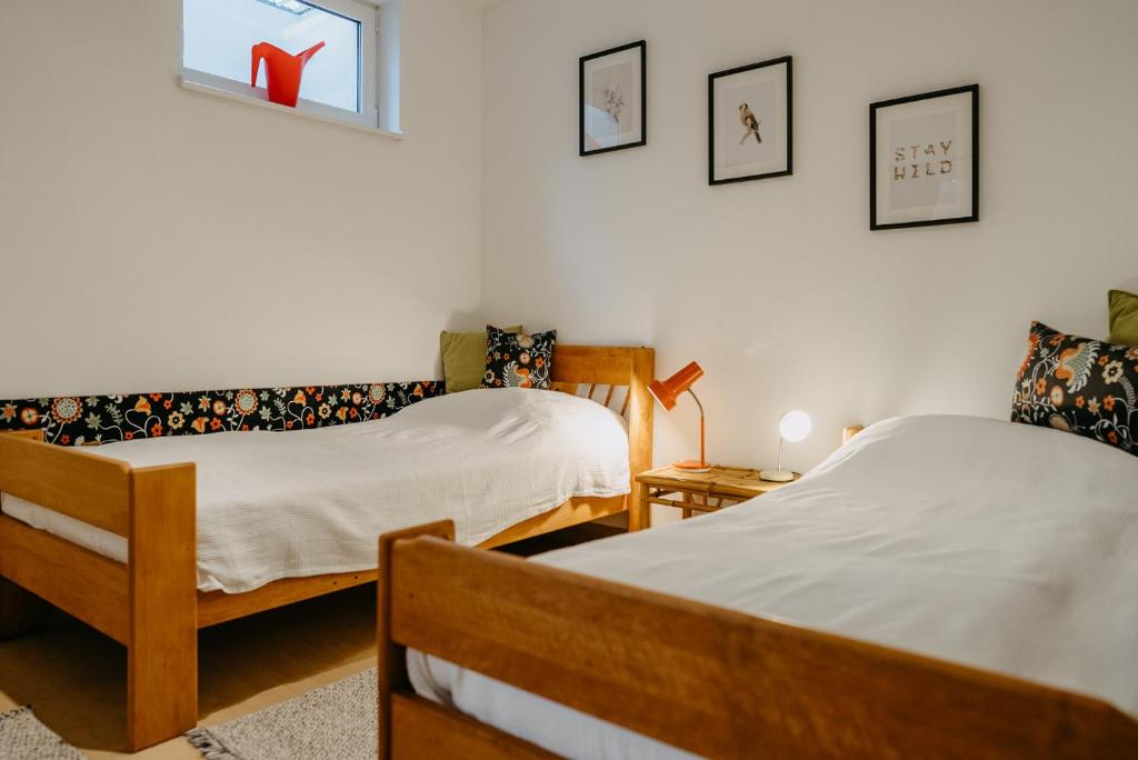 Voodi või voodid majutusasutuse Haus LUNA - Privatzimmer im sonnigen Südburgenland toas