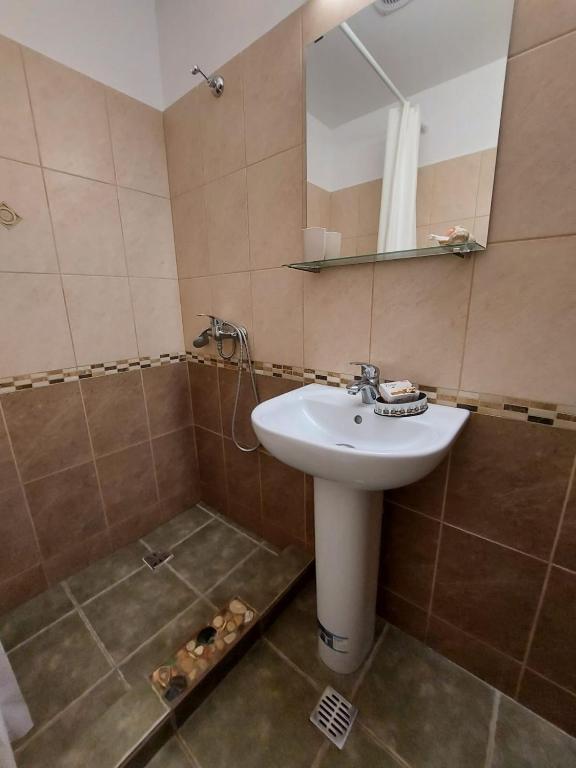 Koupelna v ubytování Vila ALBA AREAL