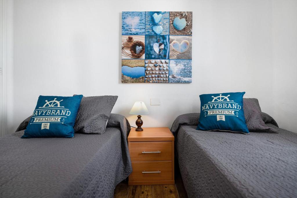 Posteľ alebo postele v izbe v ubytovaní Apartamento Zaida
