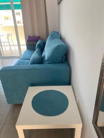 A seating area at Sunny pool view & Airco apartament Symon Mareverde
