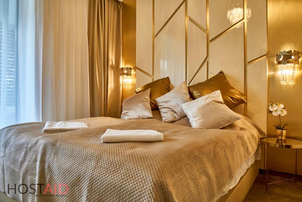 Posteľ alebo postele v izbe v ubytovaní Azúr Apartment - hostAID