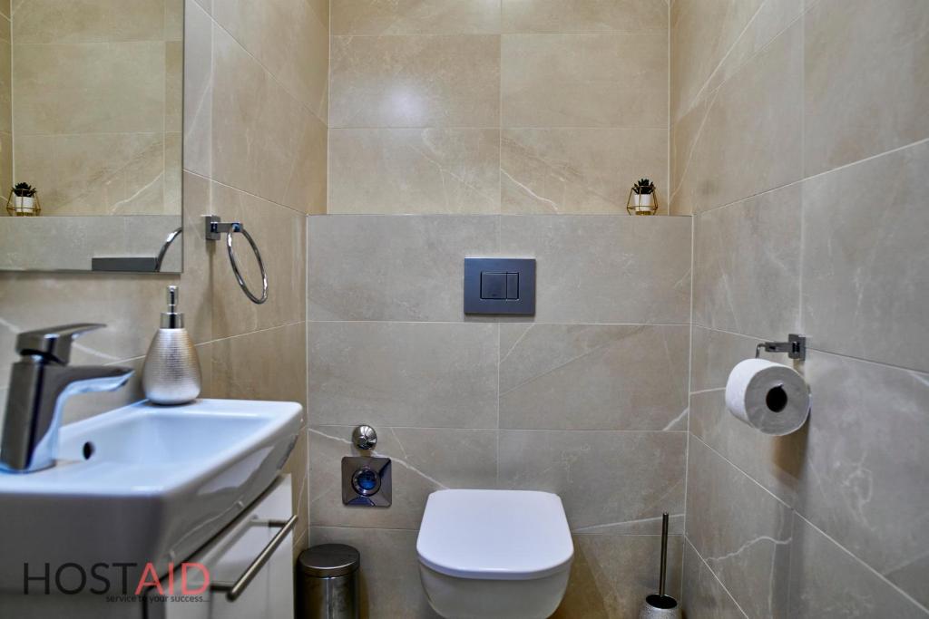 Kúpeľňa v ubytovaní Azúr Apartment - hostAID