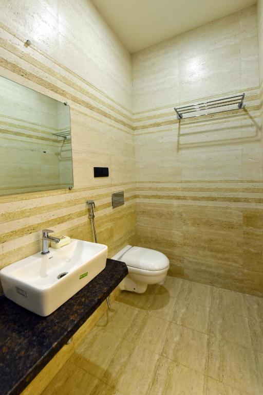Koupelna v ubytování Hotel Nikhil Regency