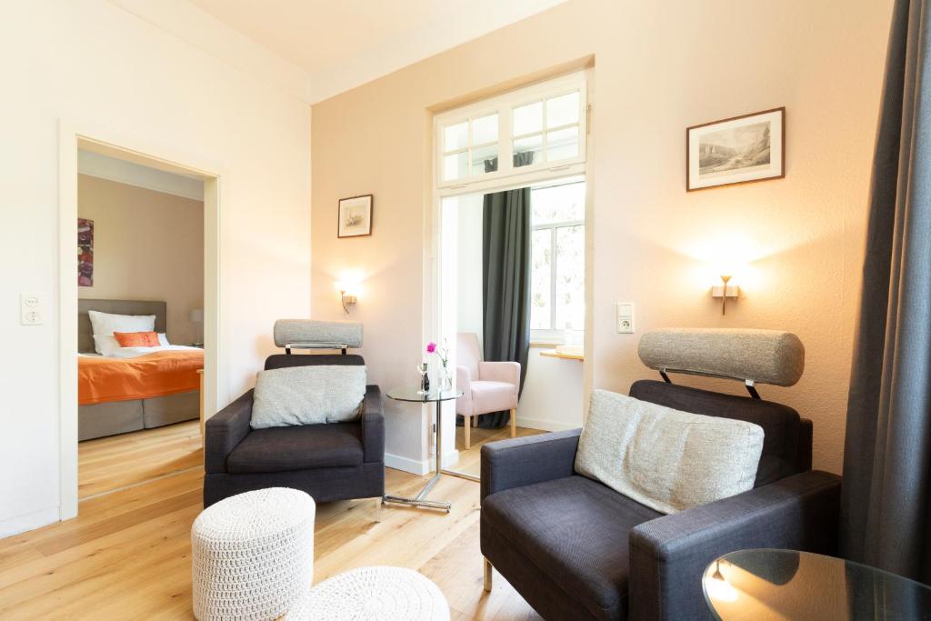 Postel nebo postele na pokoji v ubytování Villa Siegfried
