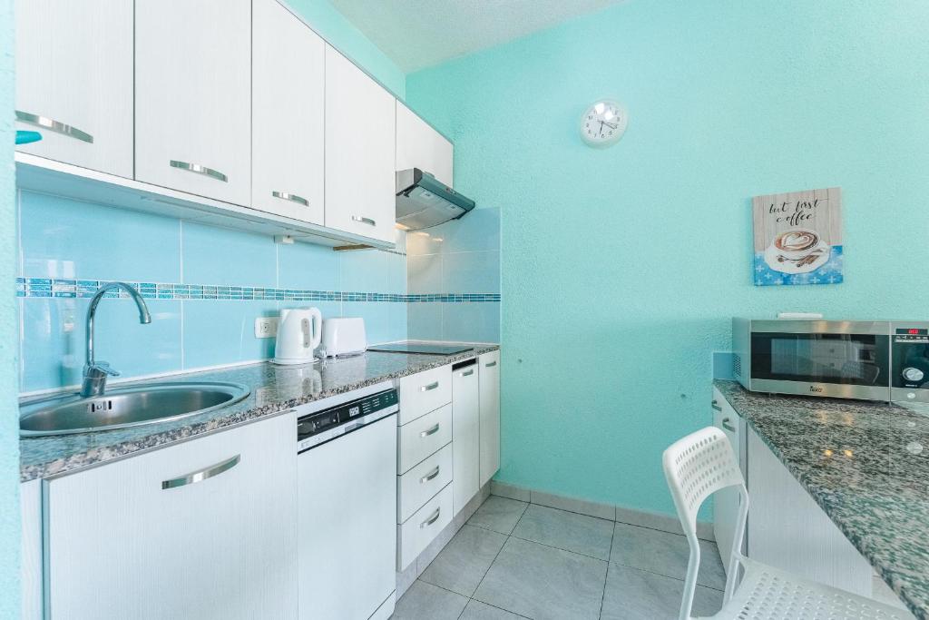 Kuchyň nebo kuchyňský kout v ubytování South Paradise