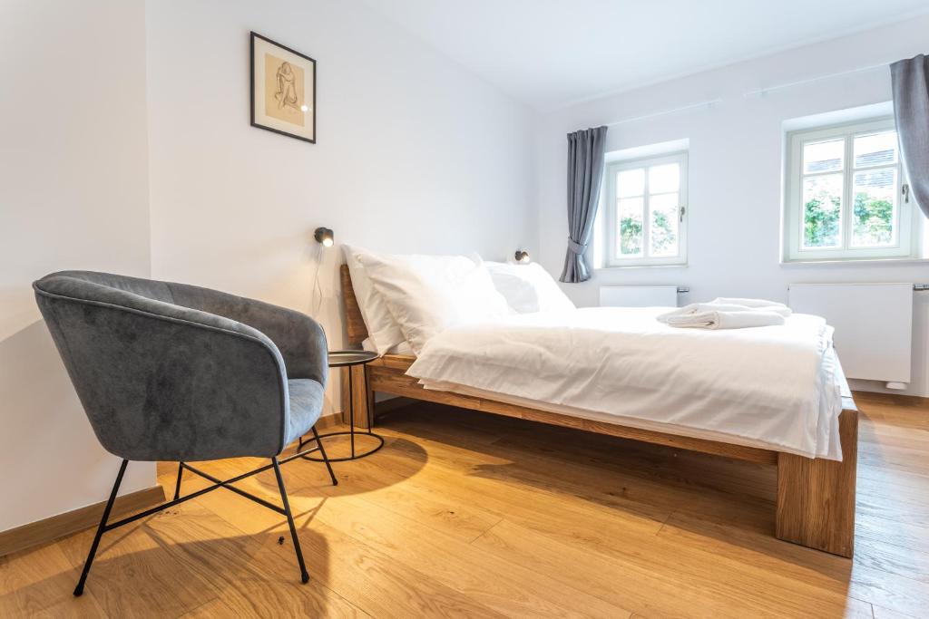 Łóżko lub łóżka w pokoju w obiekcie Apartmány VOLF - Boží Dar
