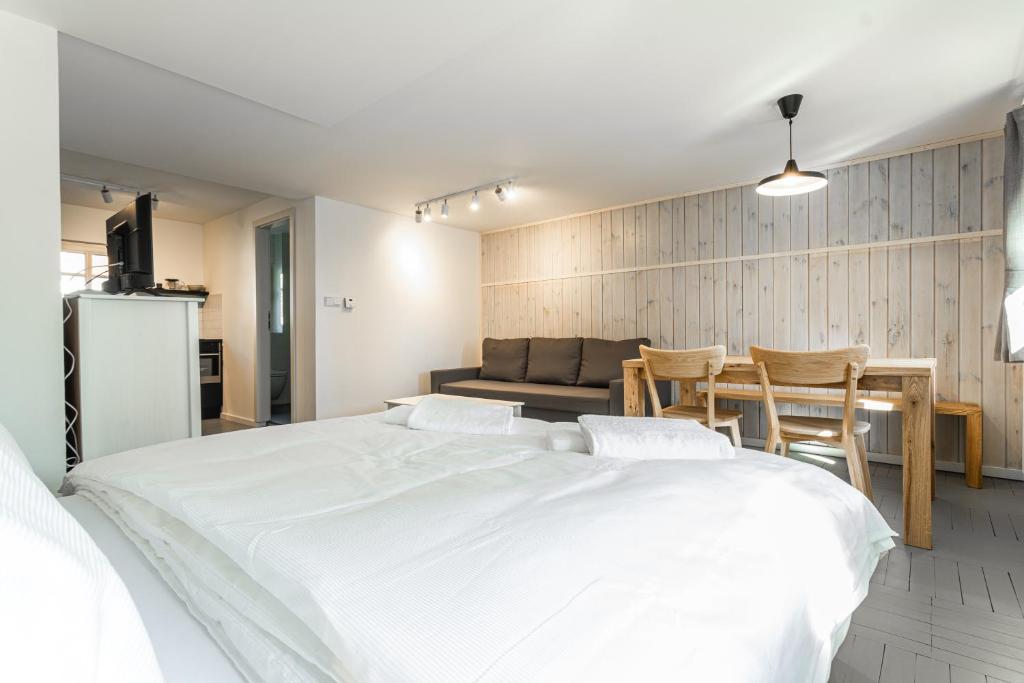 Łóżko lub łóżka w pokoju w obiekcie Apartmány VOLF - Boží Dar