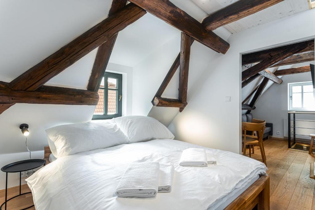 Łóżko lub łóżka w pokoju w obiekcie Apartmány VOLF - Boží Dar