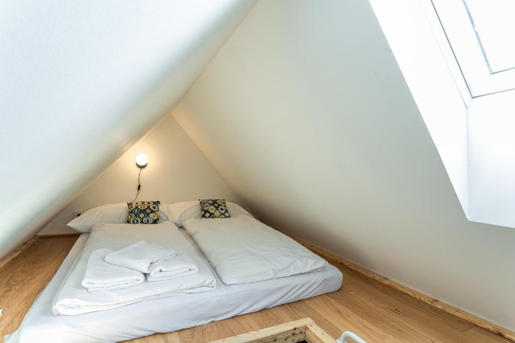 Łóżko lub łóżka w pokoju w obiekcie Apartmány VOLF - Boží Dar