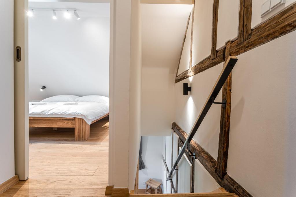 Łóżko lub łóżka w pokoju w obiekcie Apartmány VOLF - Boží Dar
