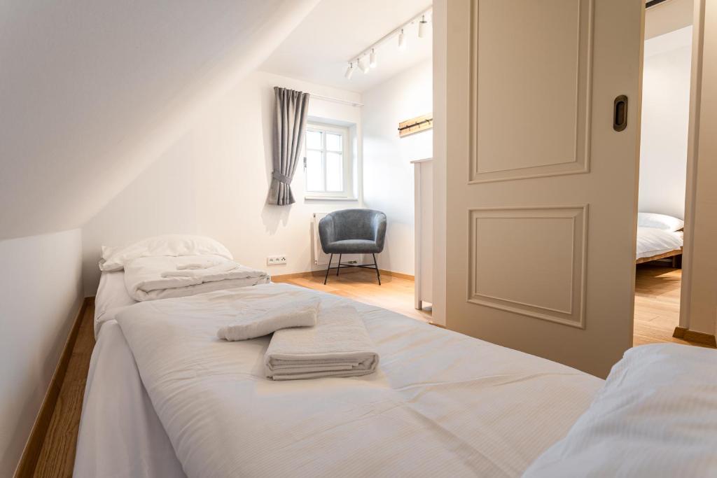 Łóżko lub łóżka w pokoju w obiekcie Apartmány VOLF - Boží Dar