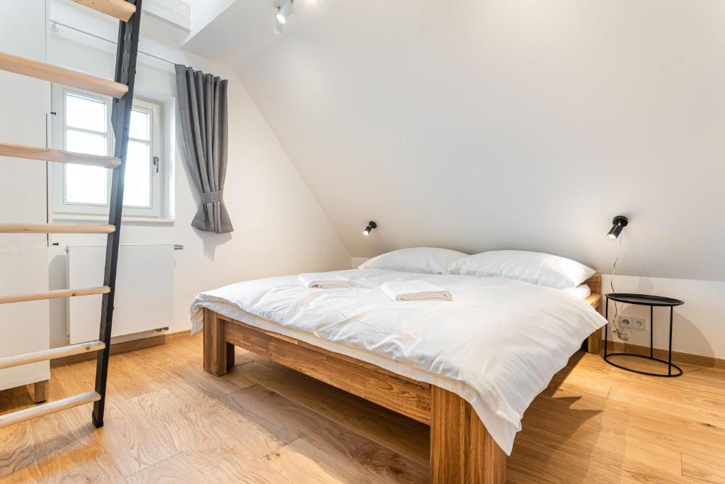 Łóżko lub łóżka w pokoju w obiekcie Apartmány VOLF - Boží Dar