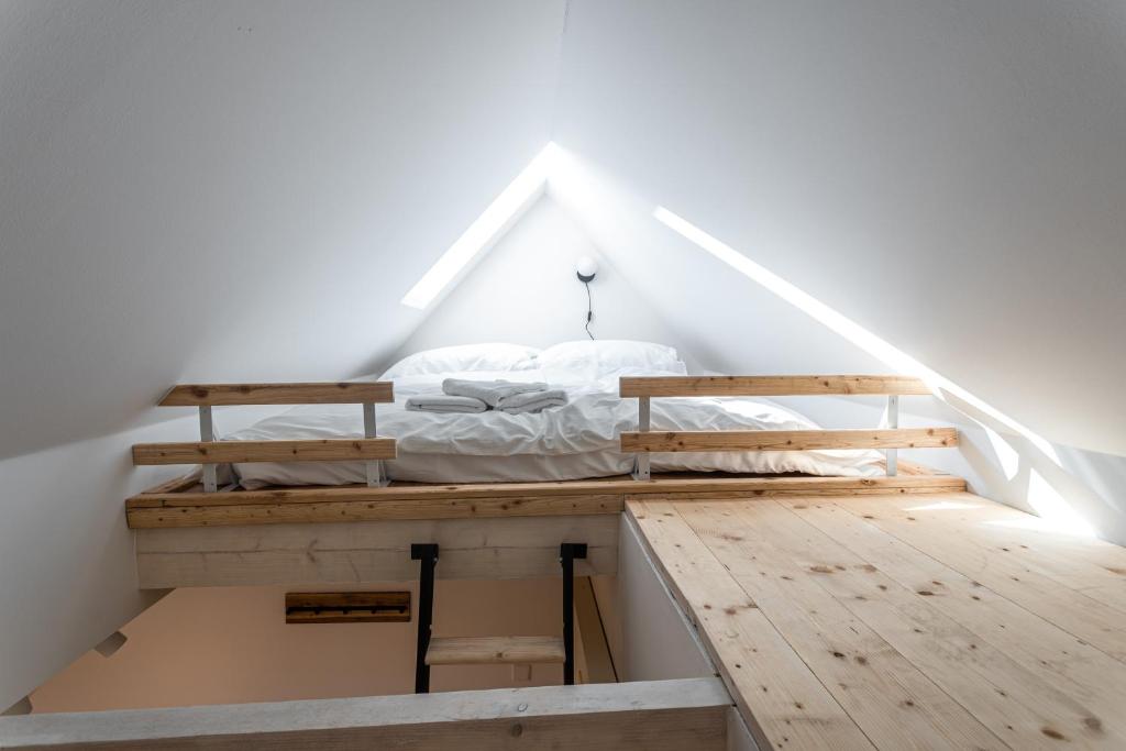 Łóżko lub łóżka w pokoju w obiekcie Apartmány VOLF - Boží Dar