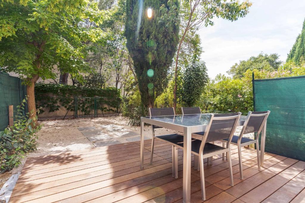 Vonkajšia záhrada v ubytovaní La Bastide de la Plage - Garage privé