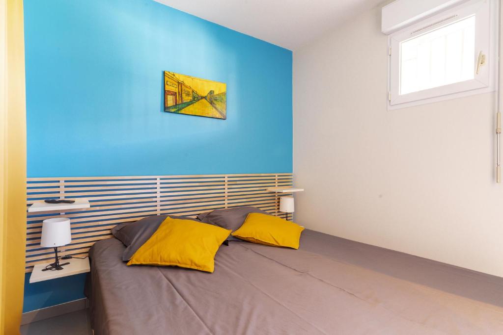 Posteľ alebo postele v izbe v ubytovaní La Bastide de la Plage - Garage privé