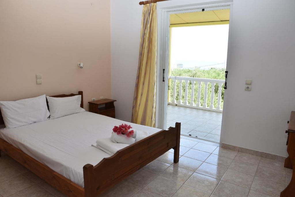 Postel nebo postele na pokoji v ubytování Casa Dyonisia Tsilivi