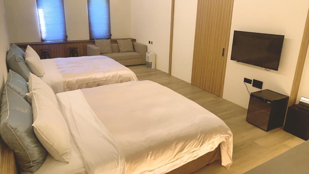 TV a/nebo společenská místnost v ubytování Shu Xin Motel