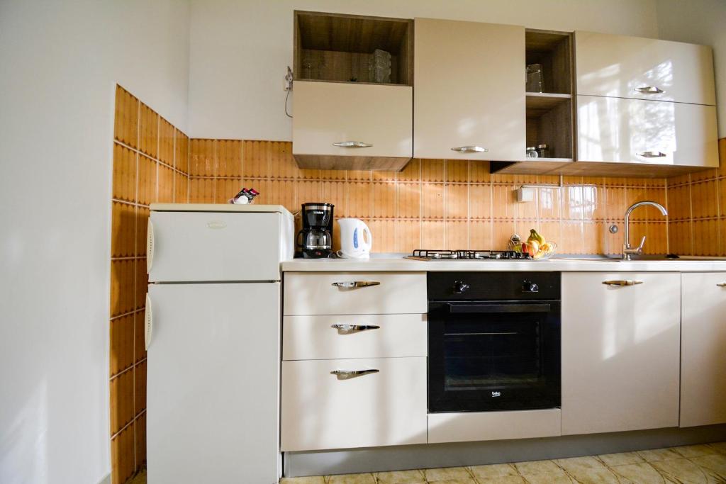 Kuchyň nebo kuchyňský kout v ubytování Bungalow Olivtree