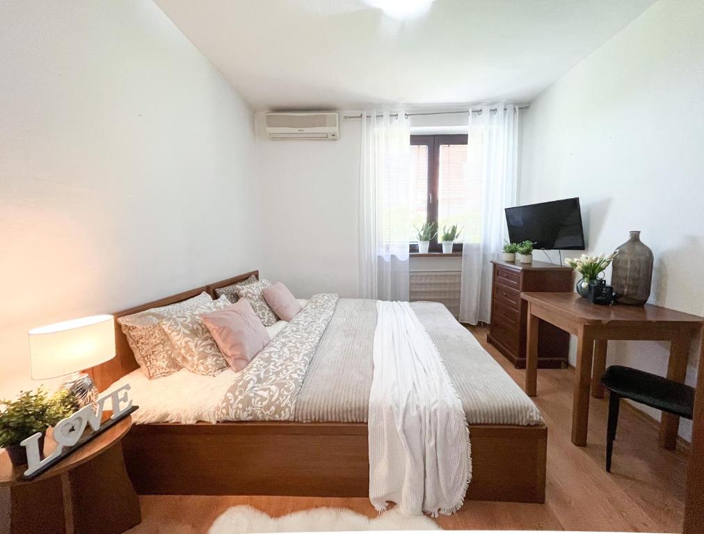 Postel nebo postele na pokoji v ubytování Business Penzion La Pera