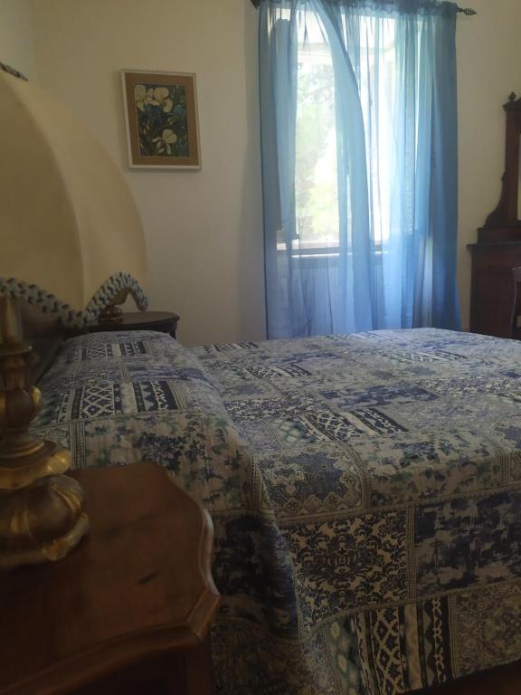 Postel nebo postele na pokoji v ubytování Camere le cascatelle