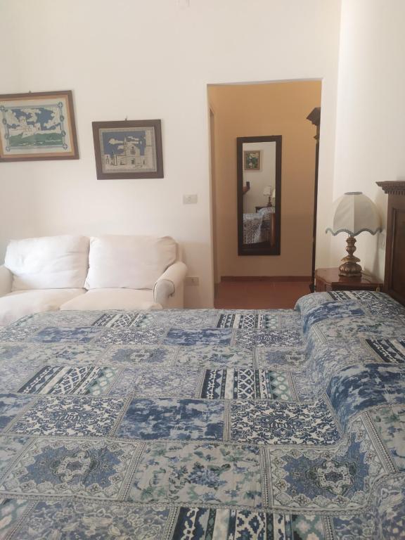Postel nebo postele na pokoji v ubytování Camere le cascatelle